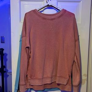 2 blue and pink sweaters